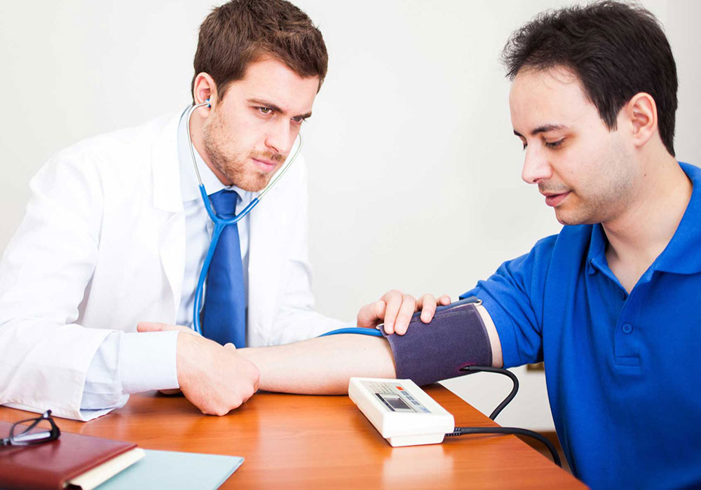 Doctor examining the blood pressure